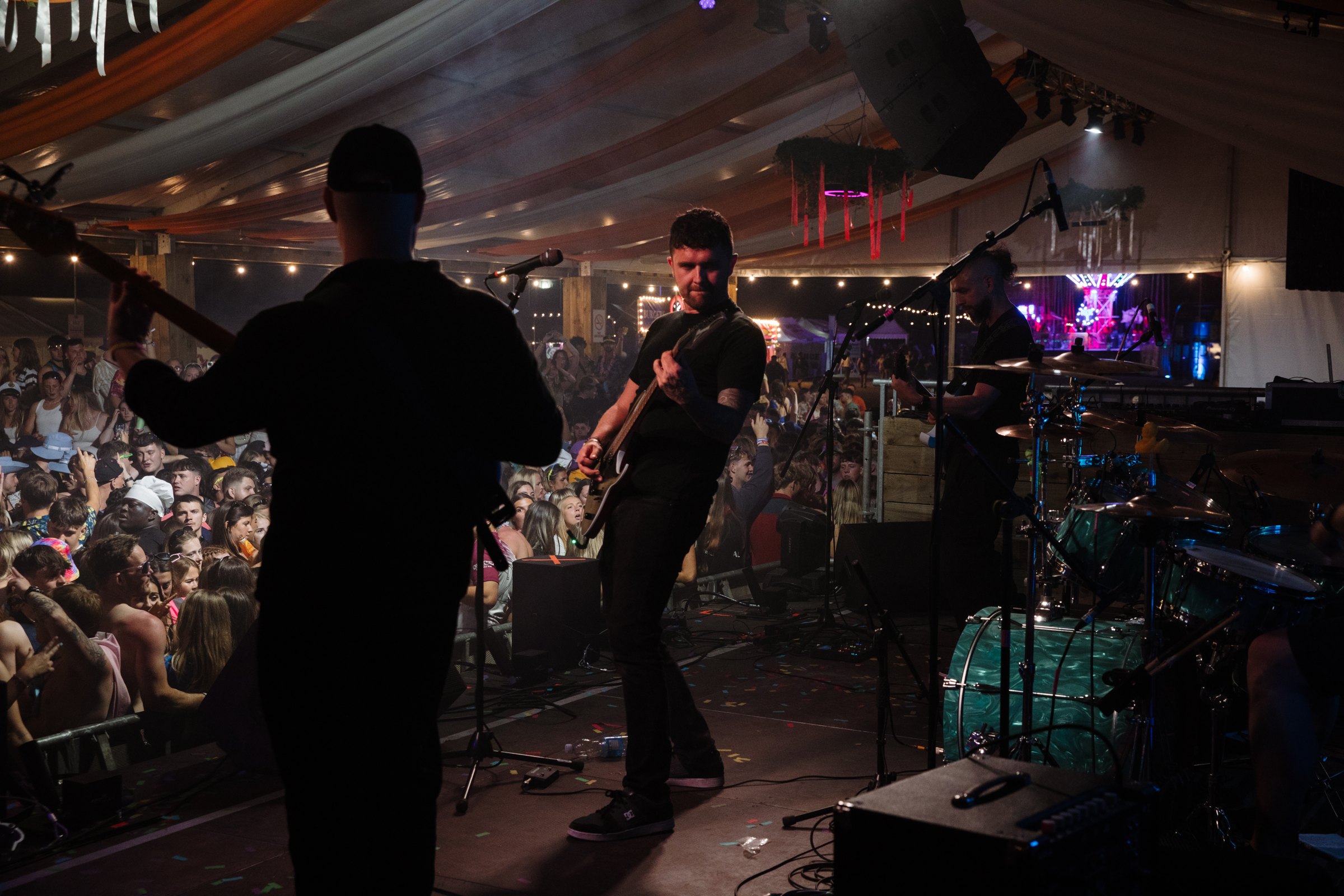Looking out over a packed crowd from behind the bass at an Ironhide gig